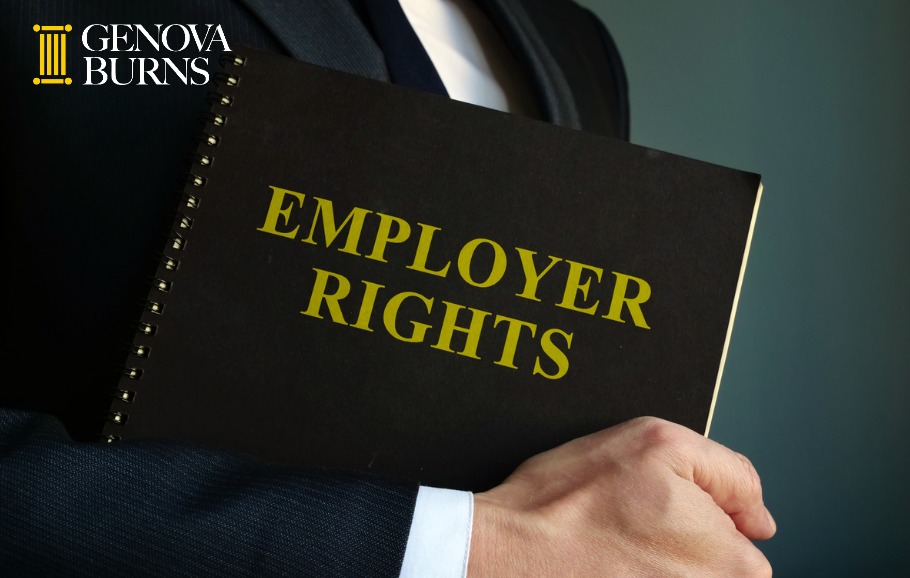 Businessman holding Employer Rights textbook