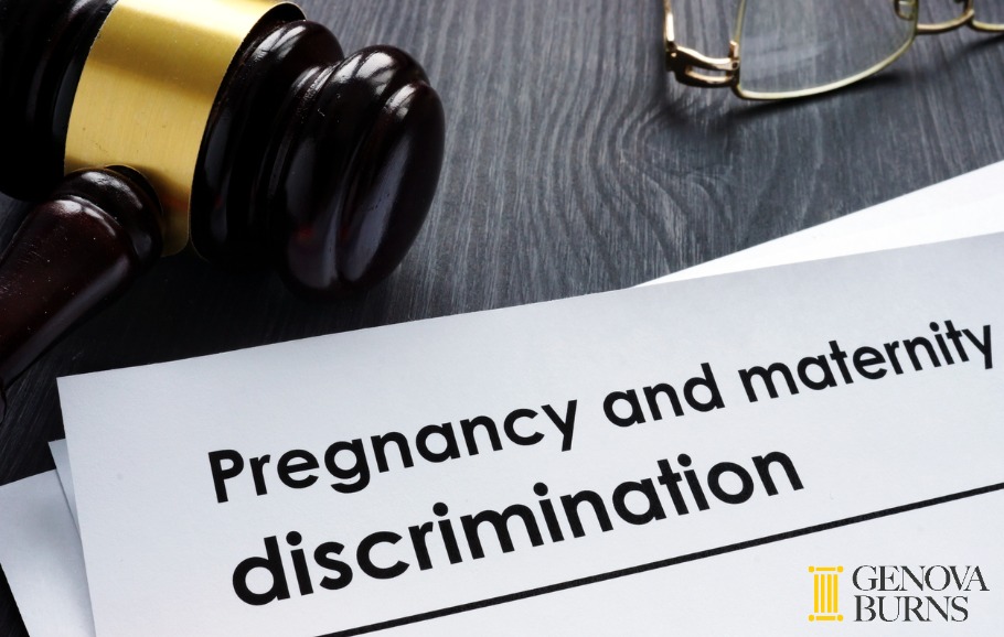 Documents about pregnancy and maternity discrimination and gavel
