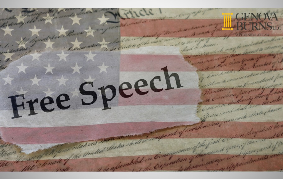 Free Speech superimposed over a background of the constitution and the American flag